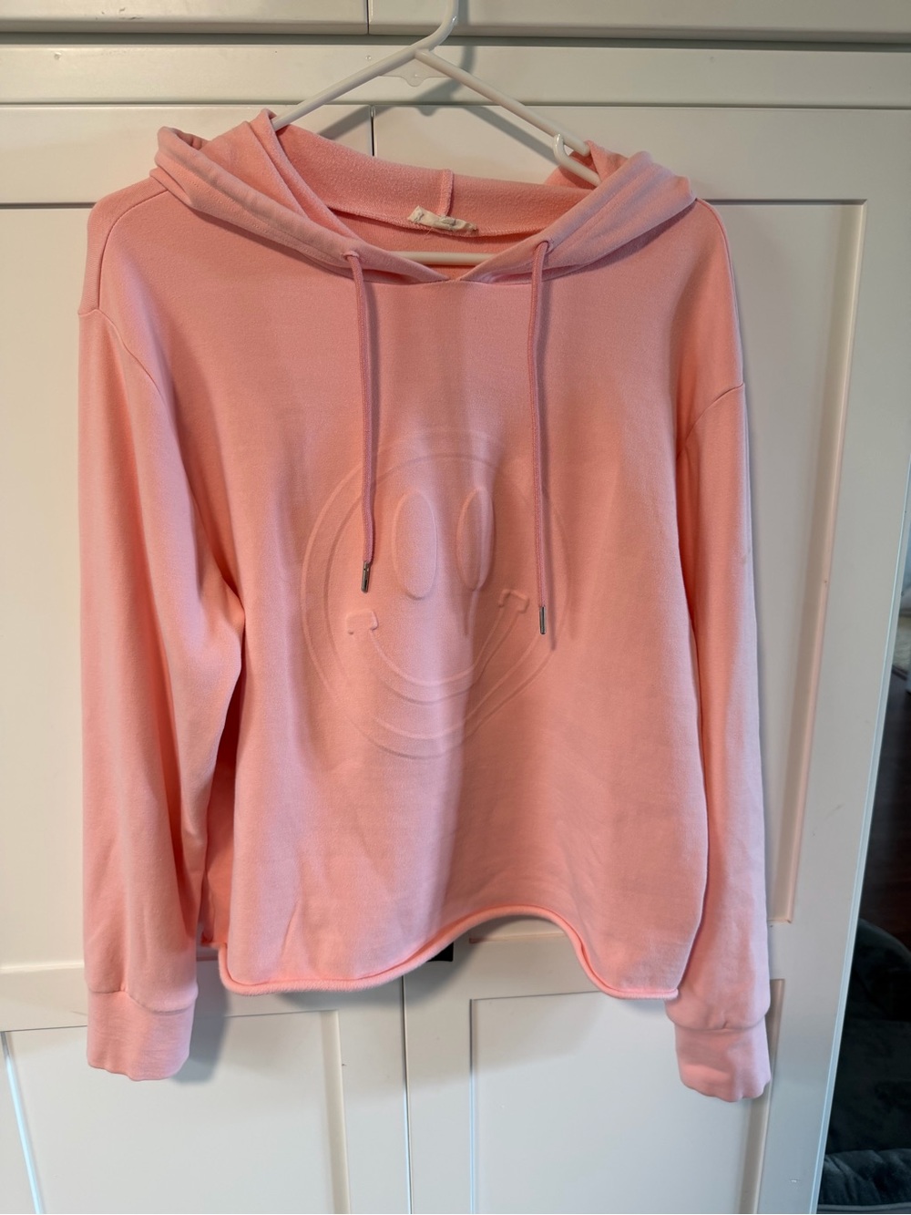 easel  Pink Embossed Smile Hoodie